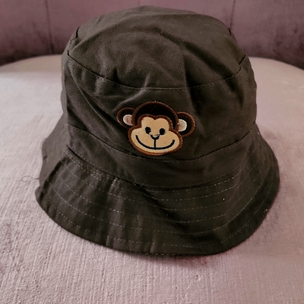 Reversible Infant Sun cap Monkey embroidery and Brown and white strip on reverse